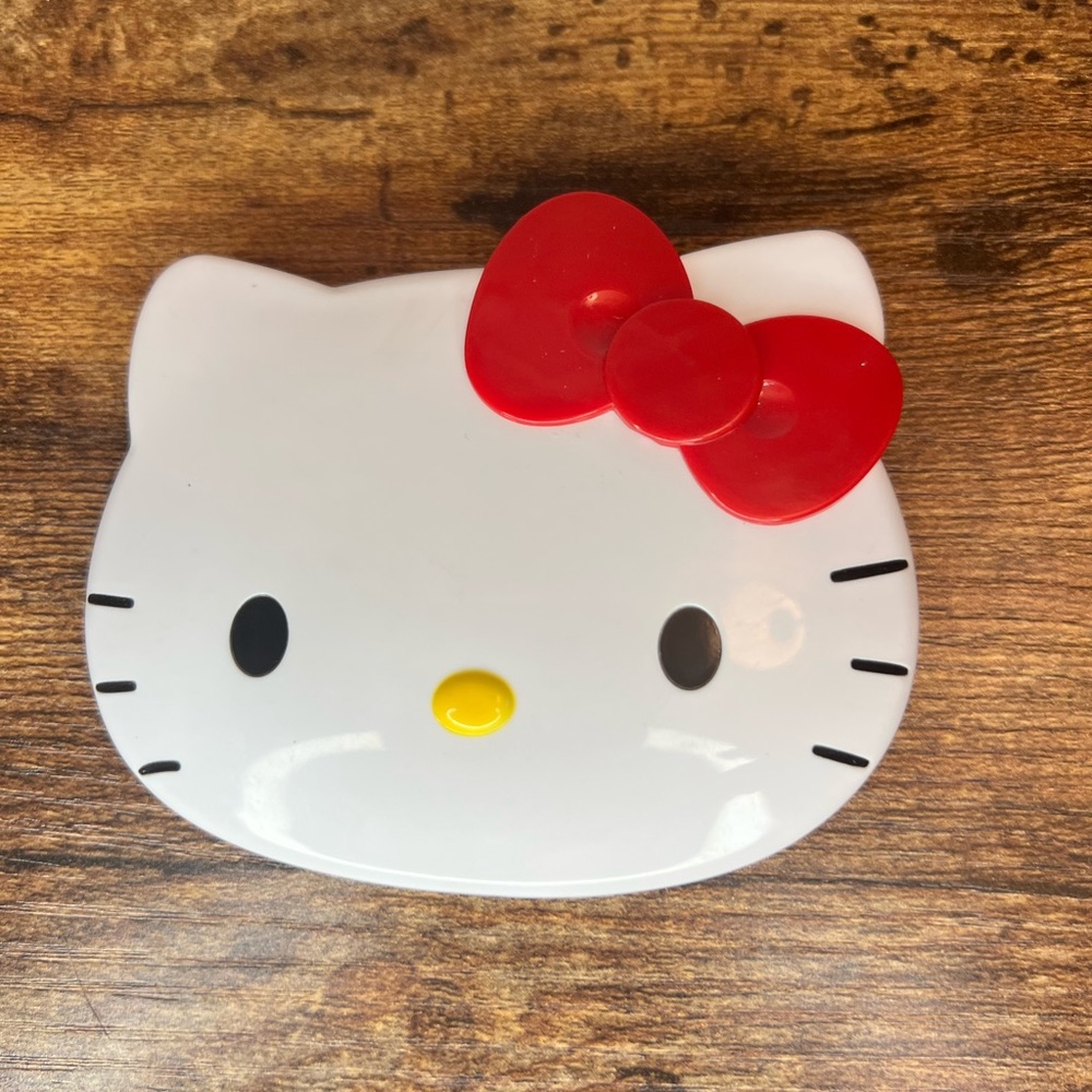 Hello kitty compact mirror with comb